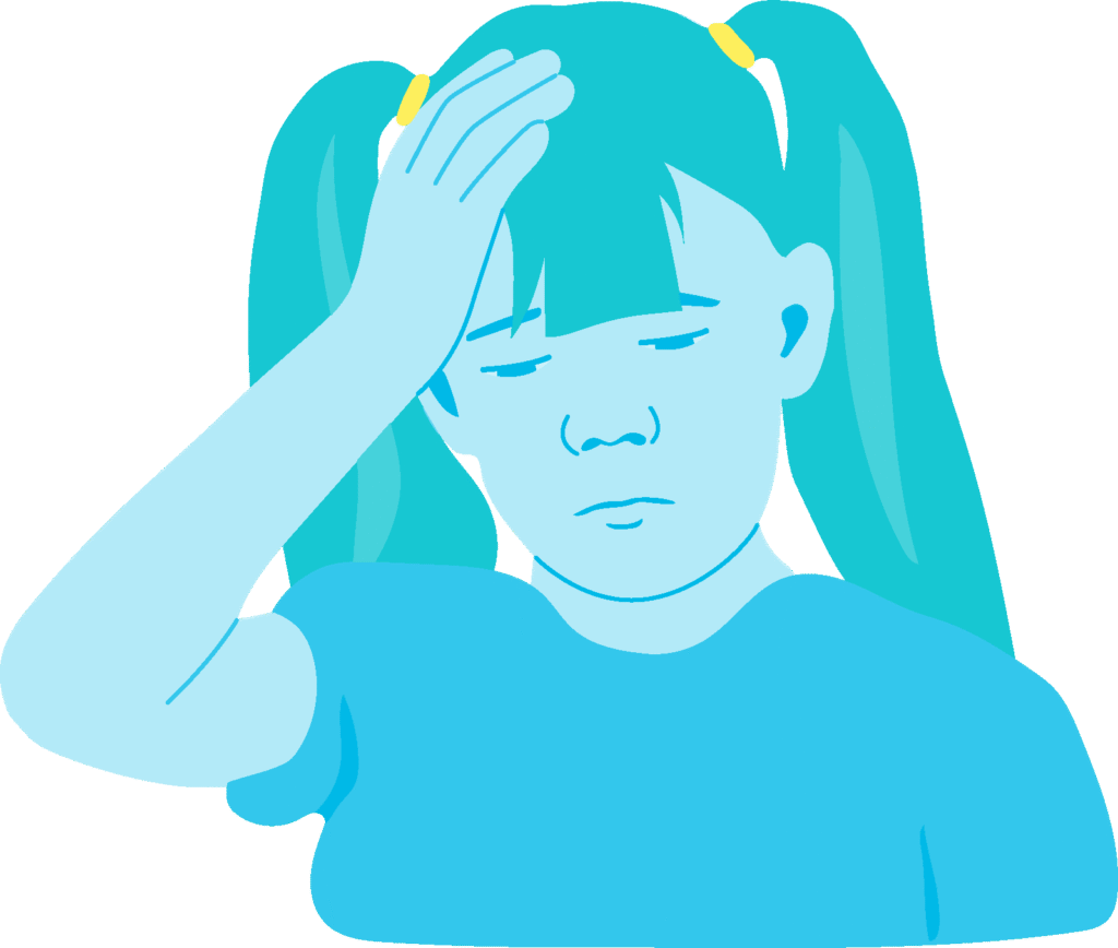 Young girl with ponytails holding a hand to her head.