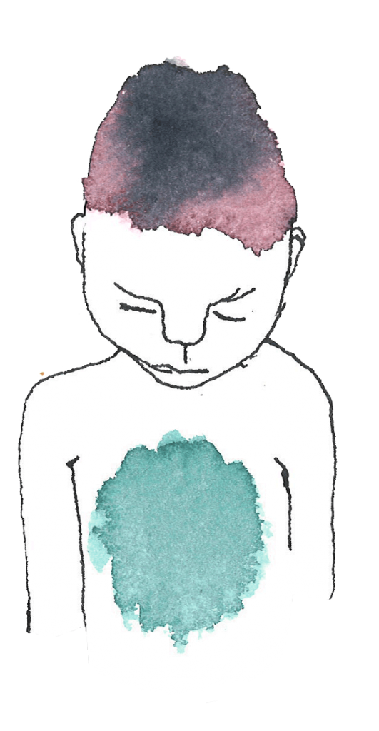 Pojke med böjt huvud.